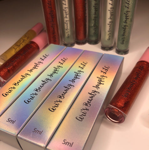 Pictured are various lipglosses sold by Ari's Beauty Supply LLC.